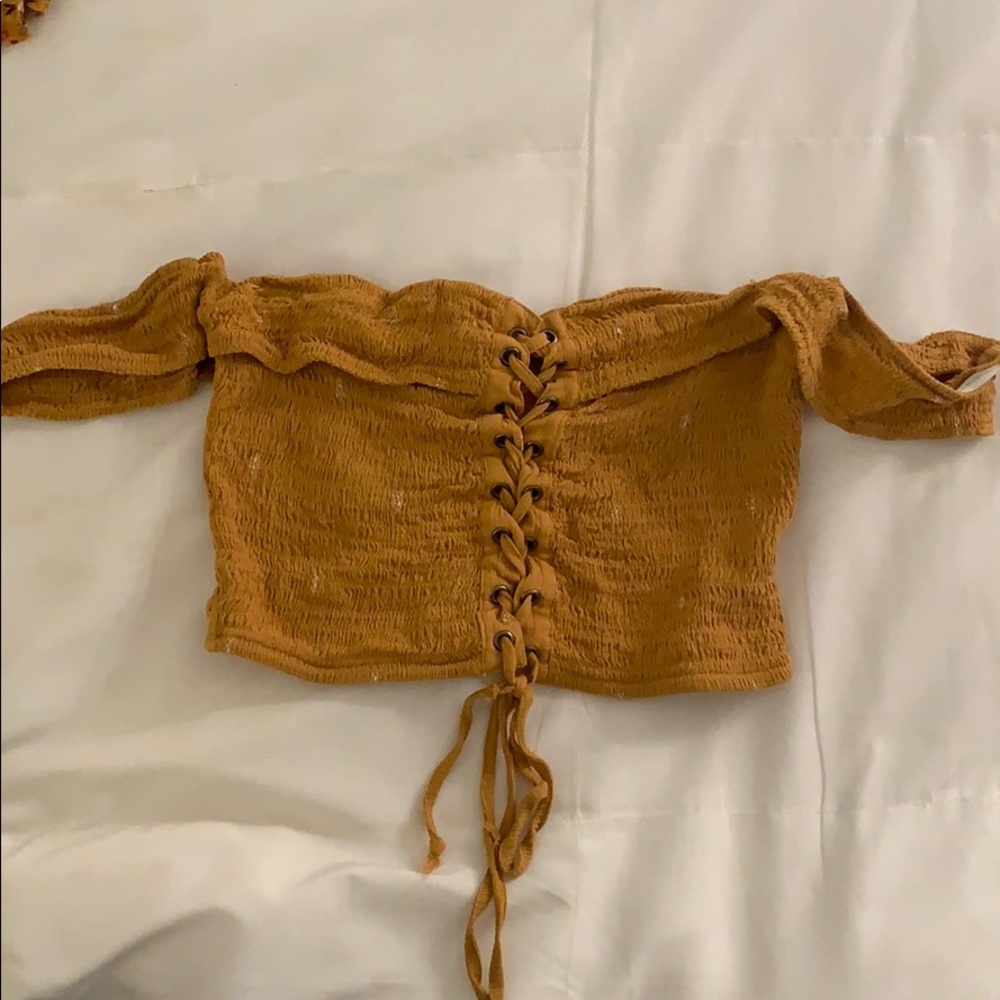 Tan front tie off the shoulder crop